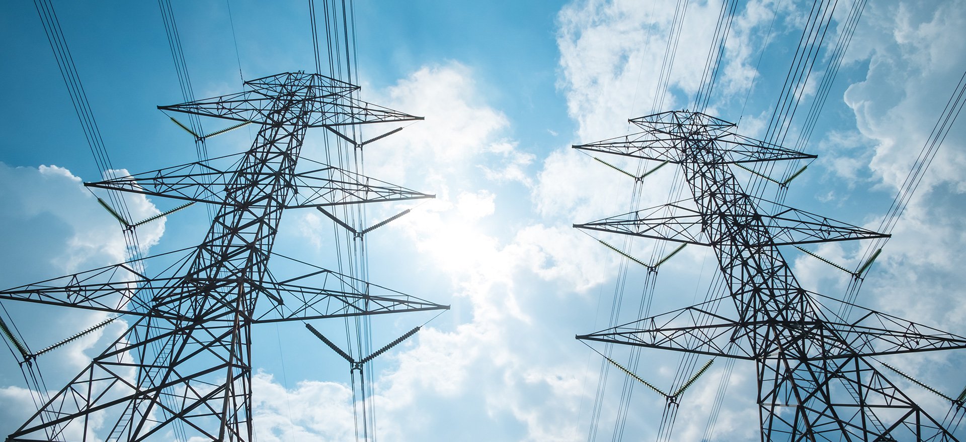 Power lines reaching the sky